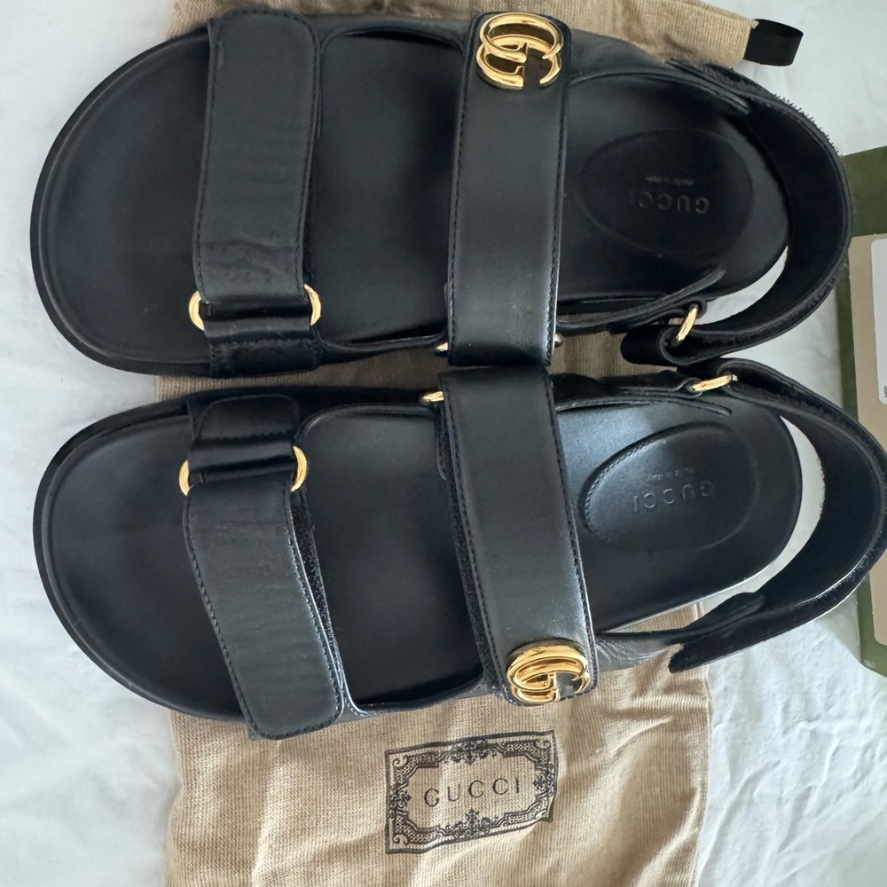 Gucci Black Sandals with Gold Accents